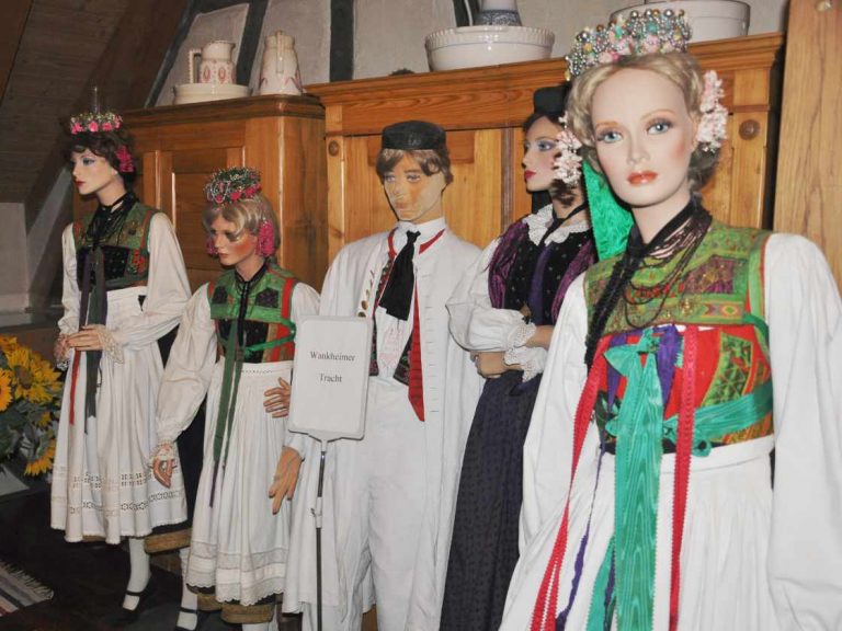Traditional costumes in the farm museum Hoefle in Jettenburg